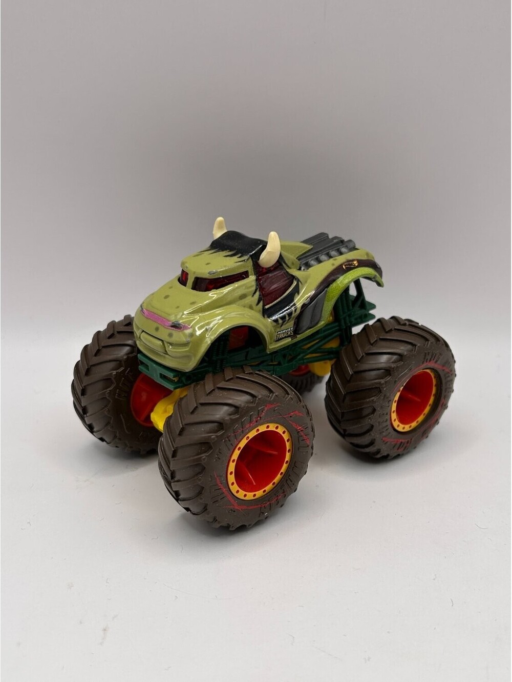 Hot Wheels Monster Trucks Steer Clear Green 1:64 Diecast Brown Mud Tires